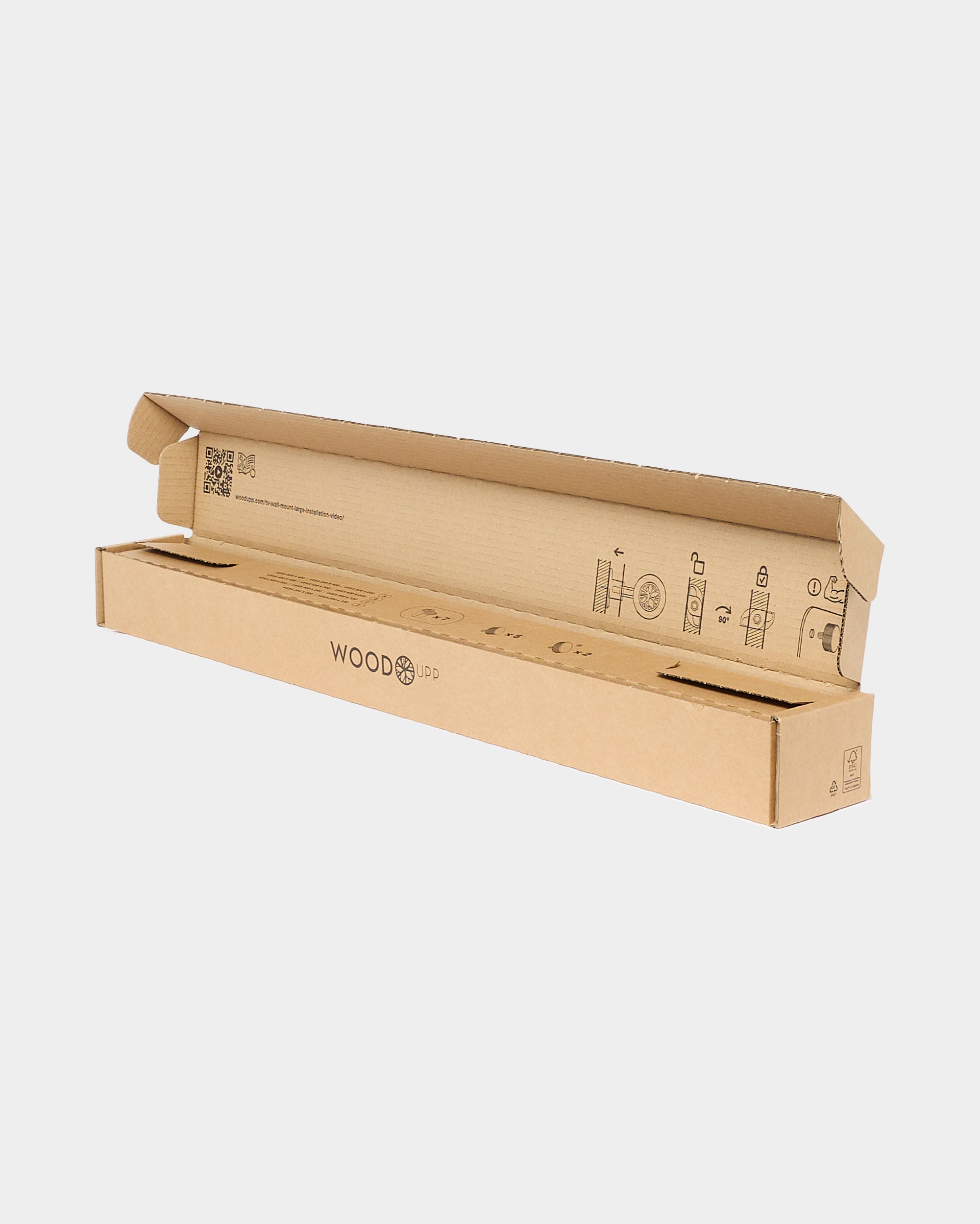 A long, open WOODUPP cardboard box with organized assembly instructions and diagrams for acoustic panels printed inside the lid.